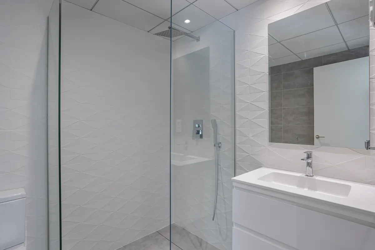 Bright bathroom with a frameless glass shower
