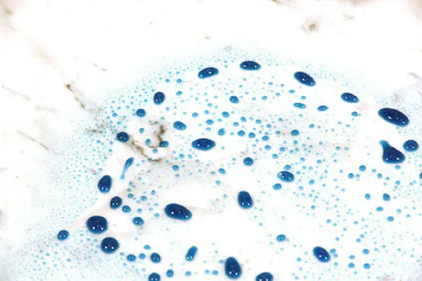 Treated marble with Diamond Bond, blue dye beading