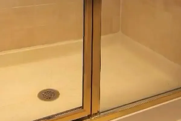 Treated shower glass with Diamond Bond two-step process, water beading